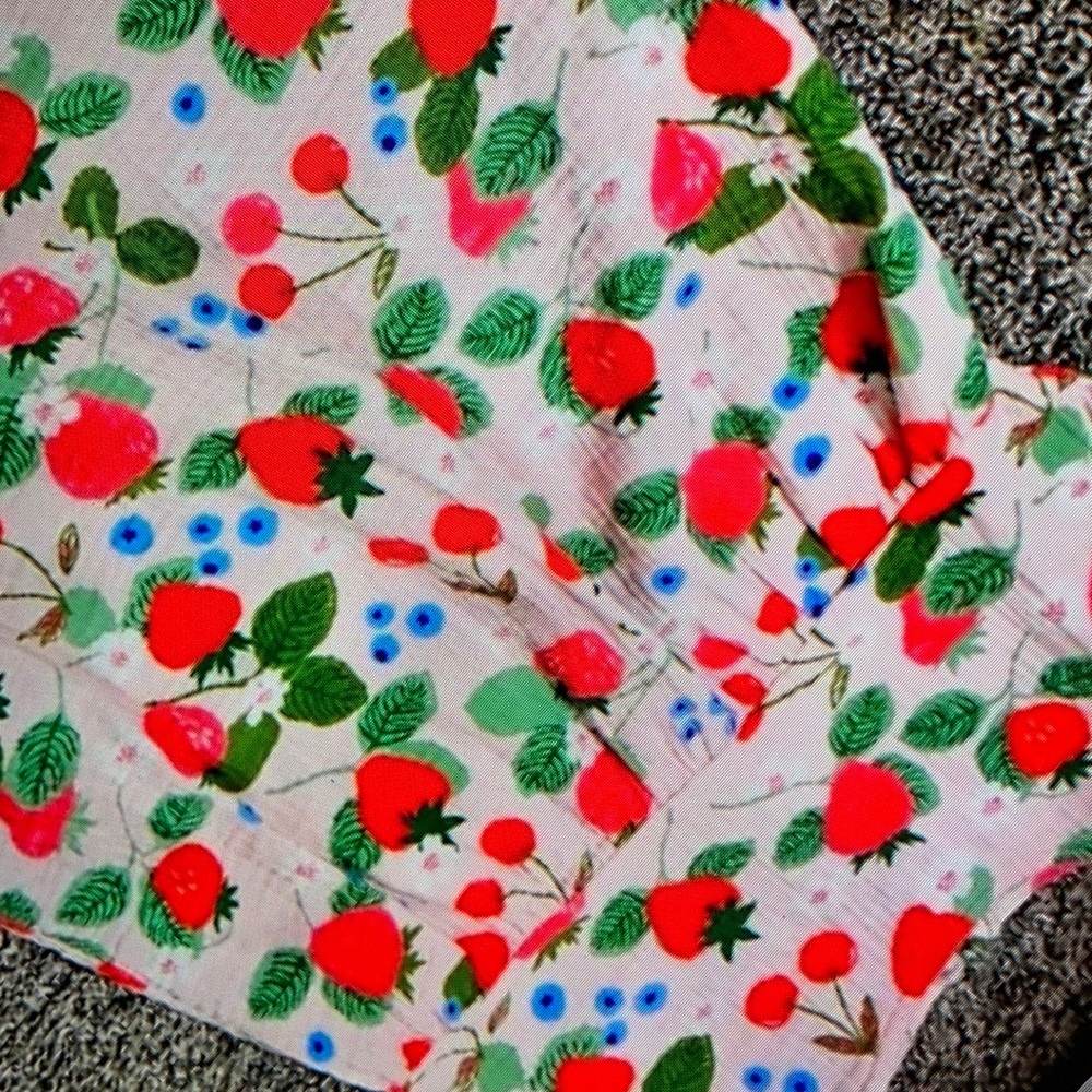 Strawberry print ruffled sleeveless blouse